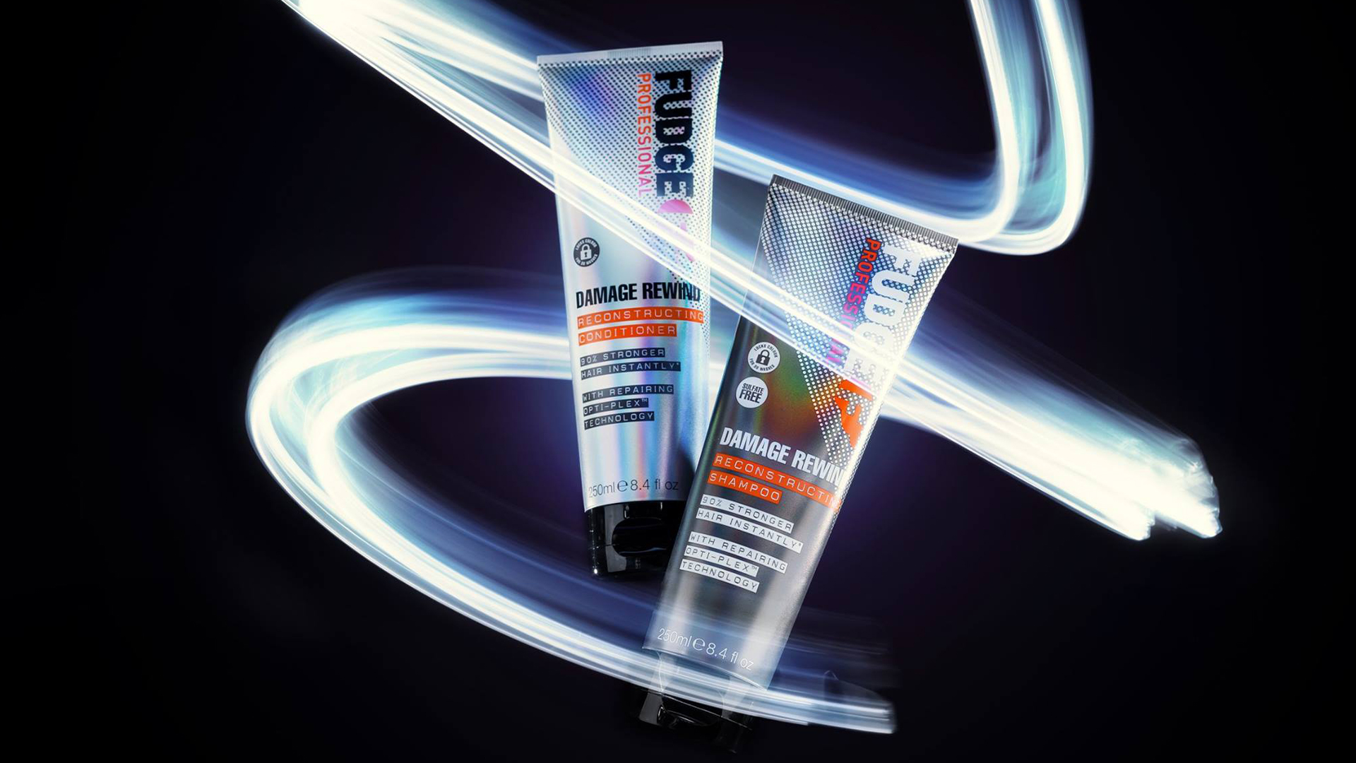 Fudge Professional Haircare branding & packaging, Damage Rewind Reconstructing Conditioner & Shampoo, winding light graphic.
