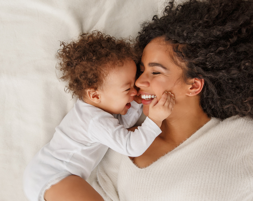 Medela, Brand guardianship, packaging, structural & digital design, Baby Products, Mother and Baby on bed.